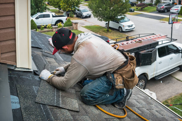 Professional Roofing technician working in Huntley, IL